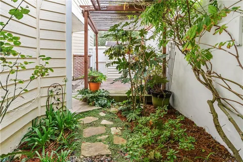 an aerial view of a house with a garden