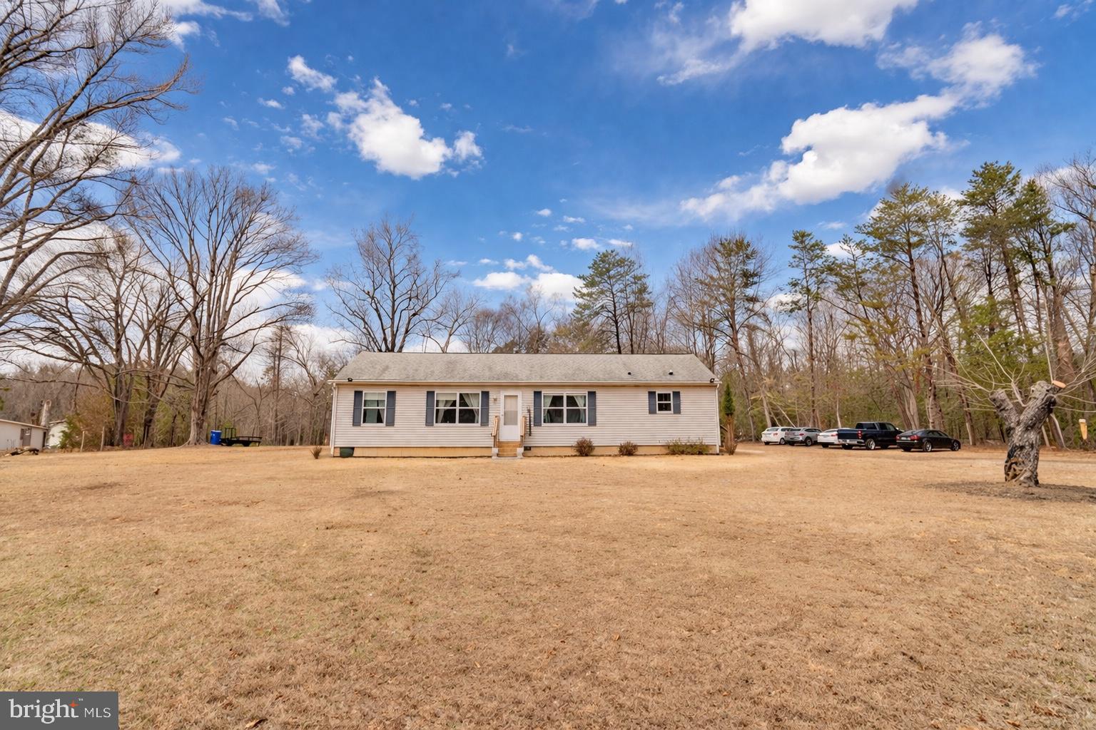 Charming home on spacious grounds.