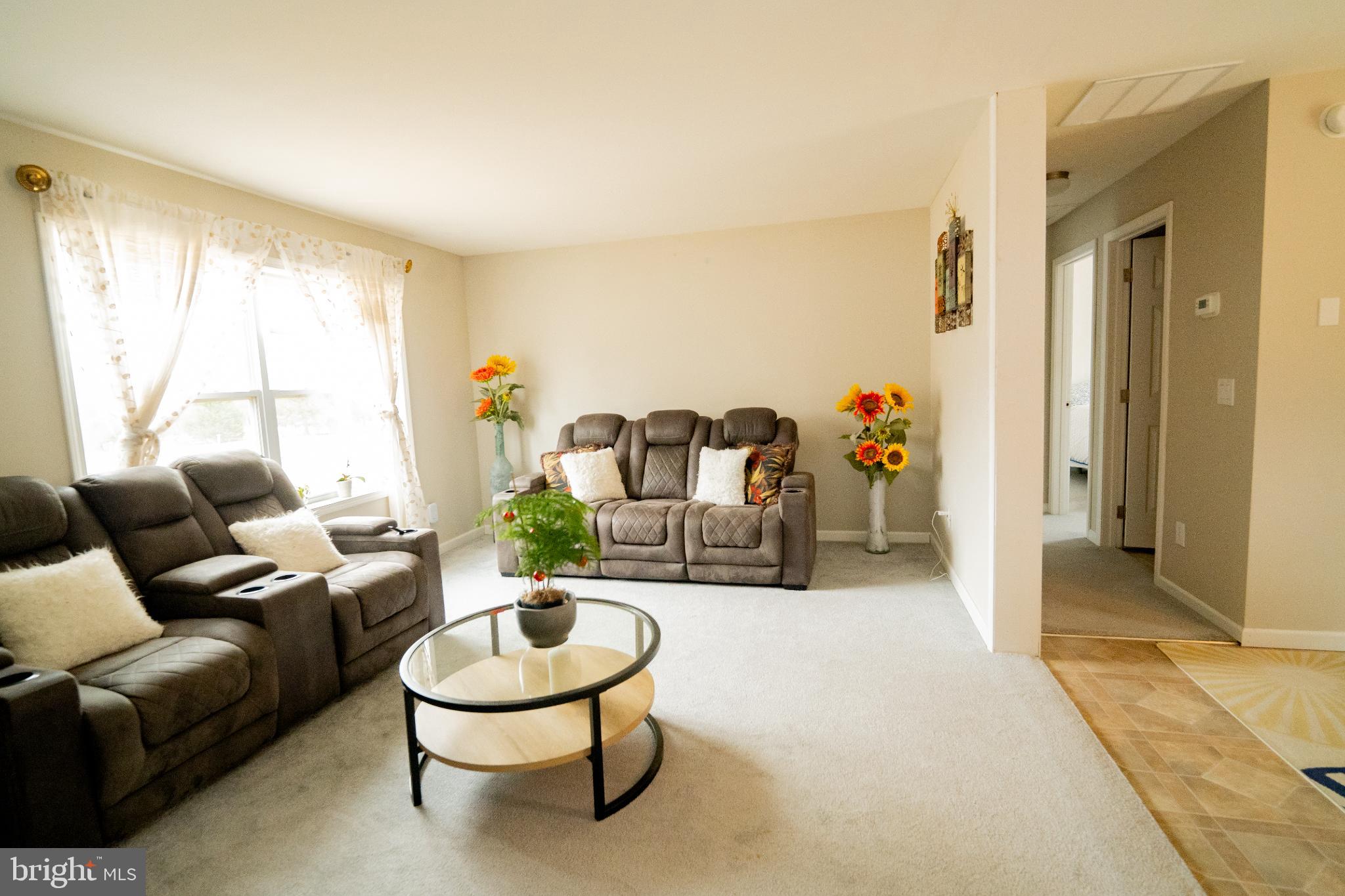2905 Smith Point Road Nanjemoy, MD 20662 - Photo 5 of 32 a living room with furniture and a large window