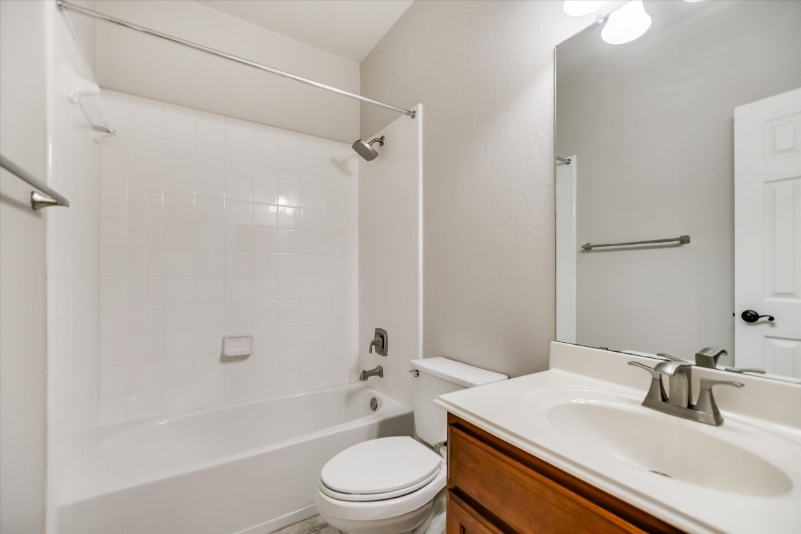 20105 Farm Pond Lane Pflugerville, TX 78660 - Photo 26 of 34 Full bath #2 featuring vanity and shower / bath combination. Located in the front portion of the home.
