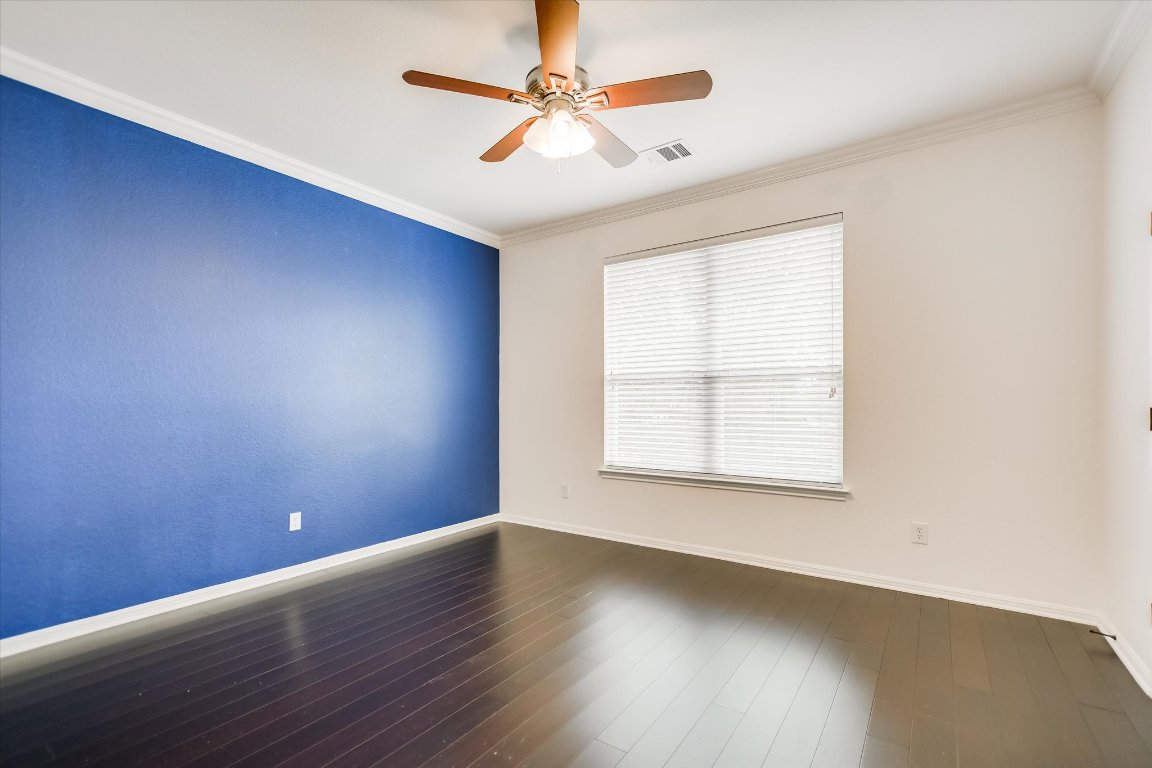 20105 Farm Pond Lane Pflugerville, TX 78660 - Photo 29 of 34 Bedroom #5 with walk-in closet located on main floor.