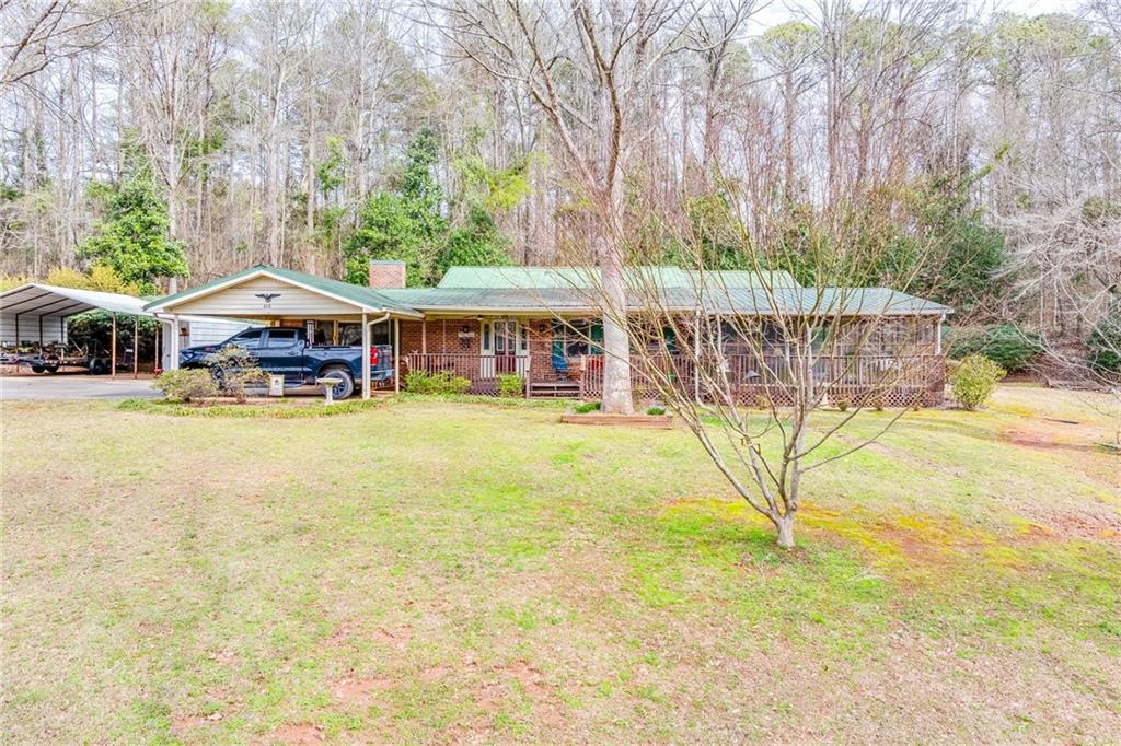 468 Payneville Road Jefferson, GA 30549 - Photo 1 of 1 a view of a swimming pool with a patio