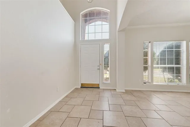 a view of an empty room with window