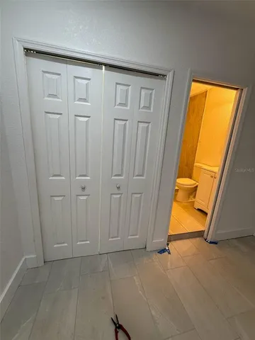 an entryway view with wooden floor