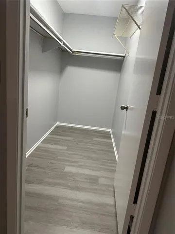 a view of an empty walk in closet