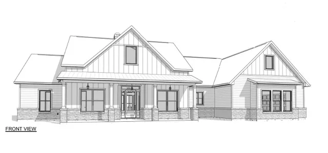 a view with cabinets a sink and a mirror