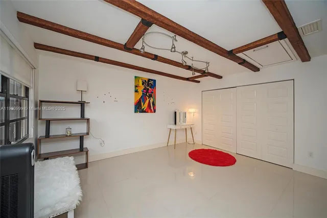 a bathroom with a sink mirror toilet and bathtub