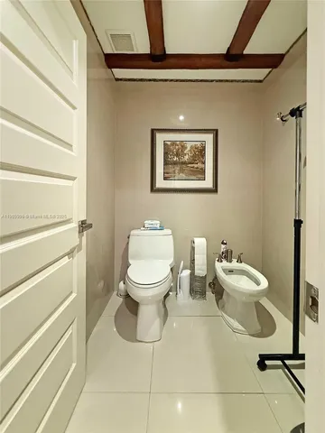 a bathroom with a bathtub and a sink