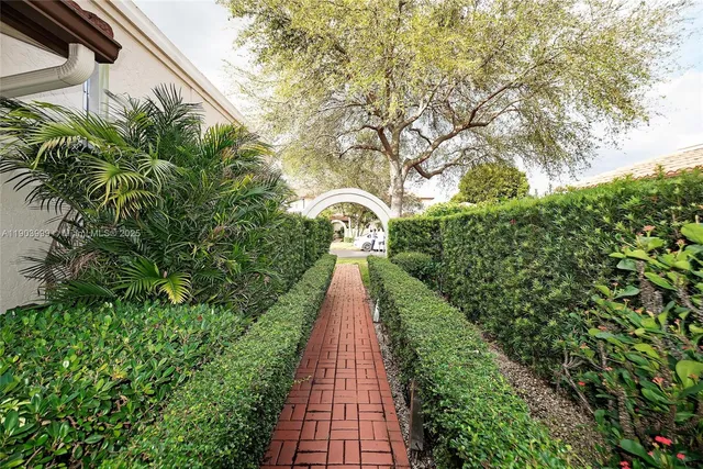a view of a garden with pathway