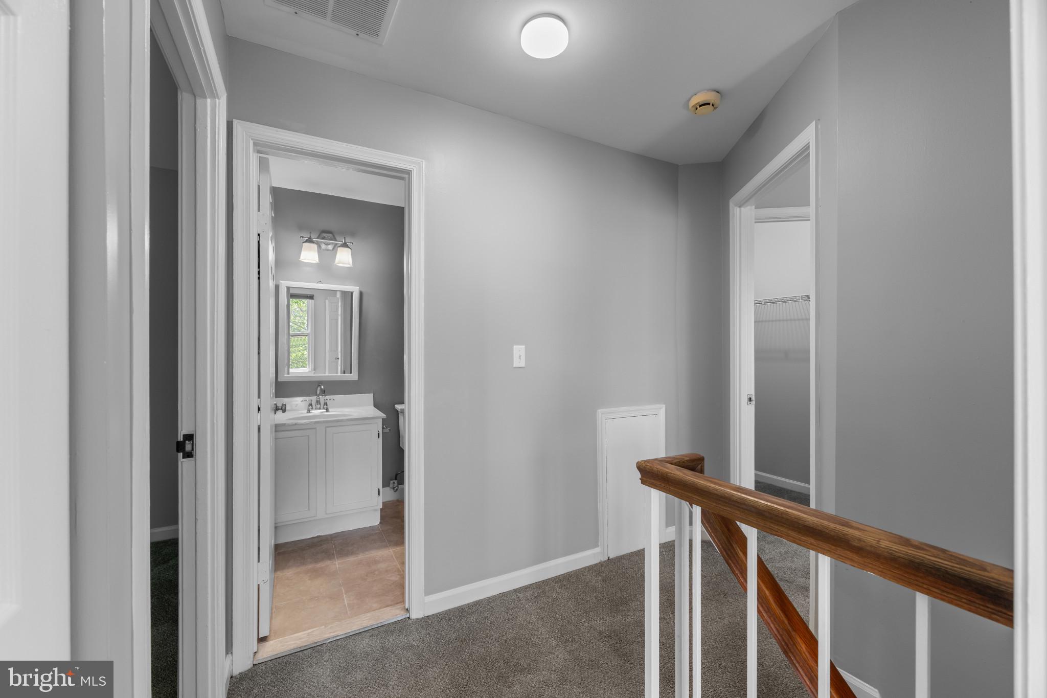 9302 Player Drive, Unit 155 Laurel, MD 20708 - Photo 35 of 43 a view of a hallway with a elevator