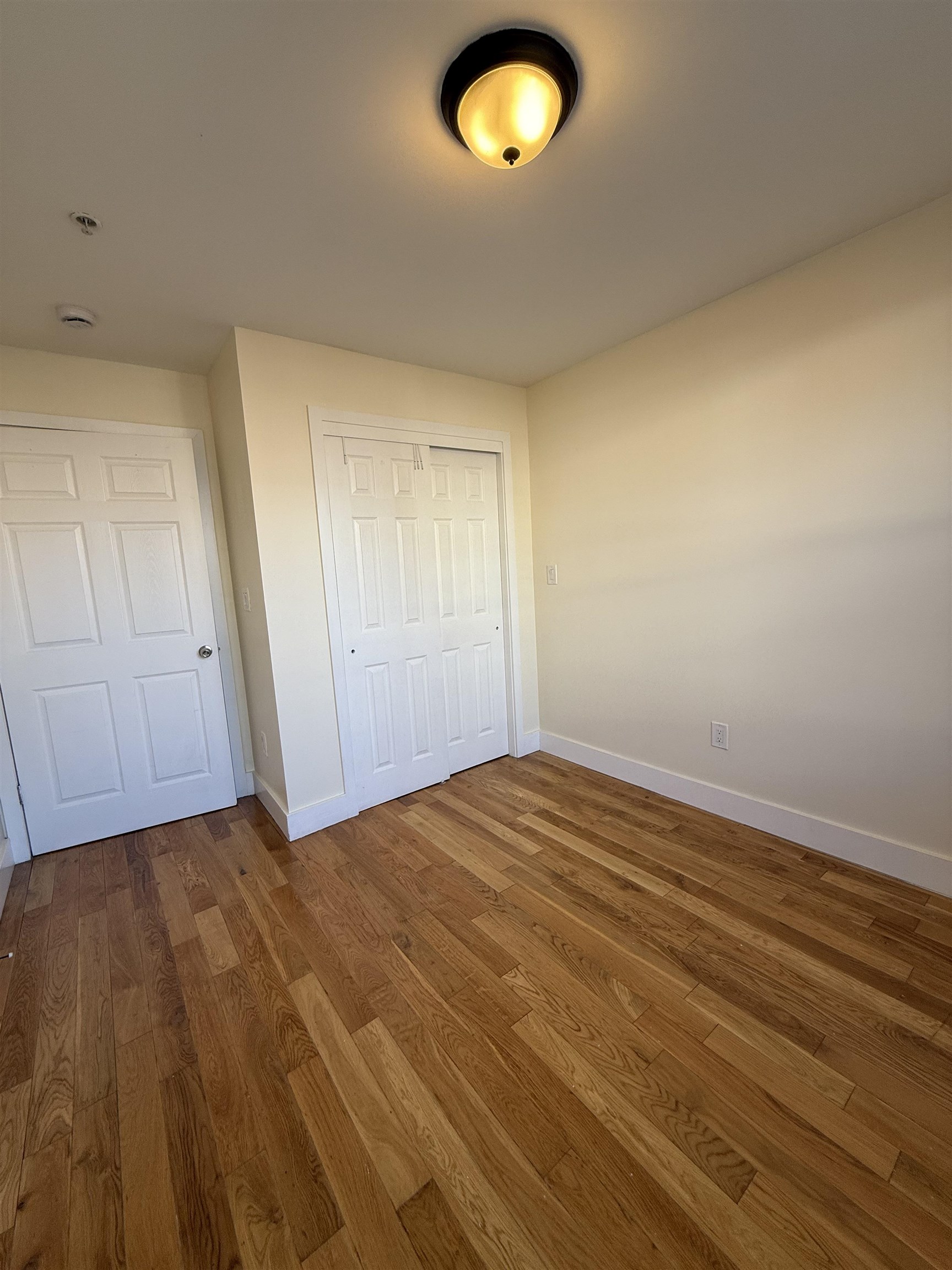 73-75 Ferry Street, Unit 7 Newark, NJ 07105 - Photo 6 of 11 a view of empty room with wooden floor