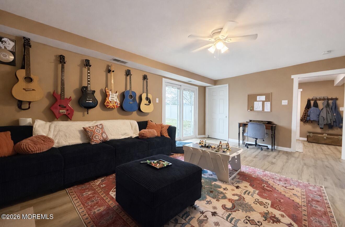 15 Commodore Court Barnegat, NJ 08005 - Photo 13 of 19 a living room with furniture and a window