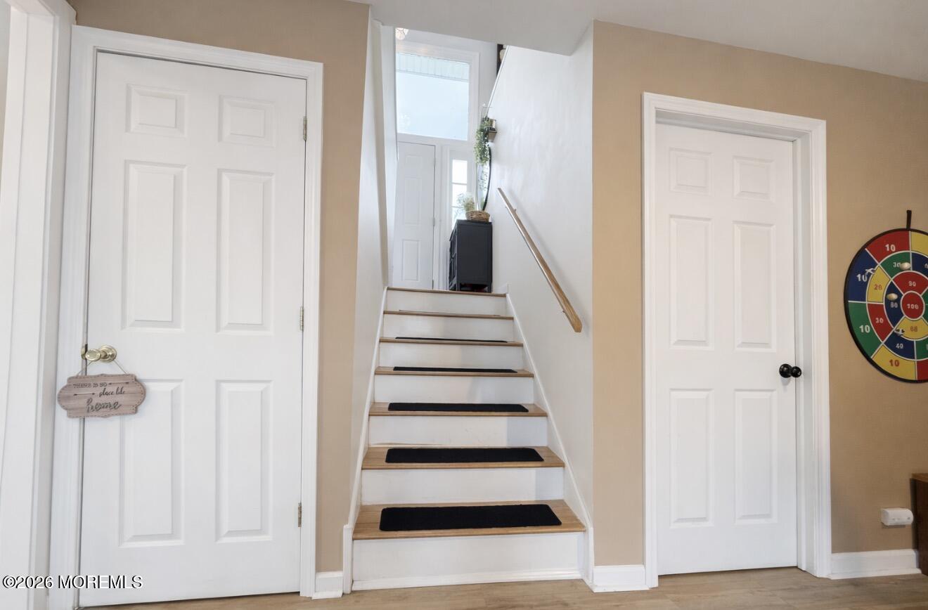 15 Commodore Court Barnegat, NJ 08005 - Photo 17 of 19 a view of entryway with furniture and wooden floor