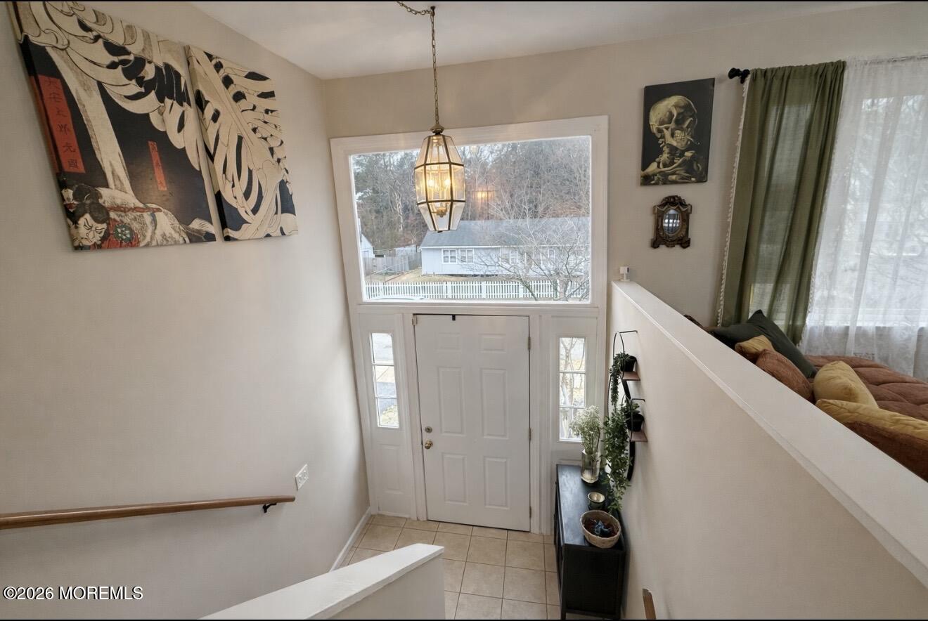 15 Commodore Court Barnegat, NJ 08005 - Photo 18 of 19 a bathroom with a granite countertop sink a mirror and shower