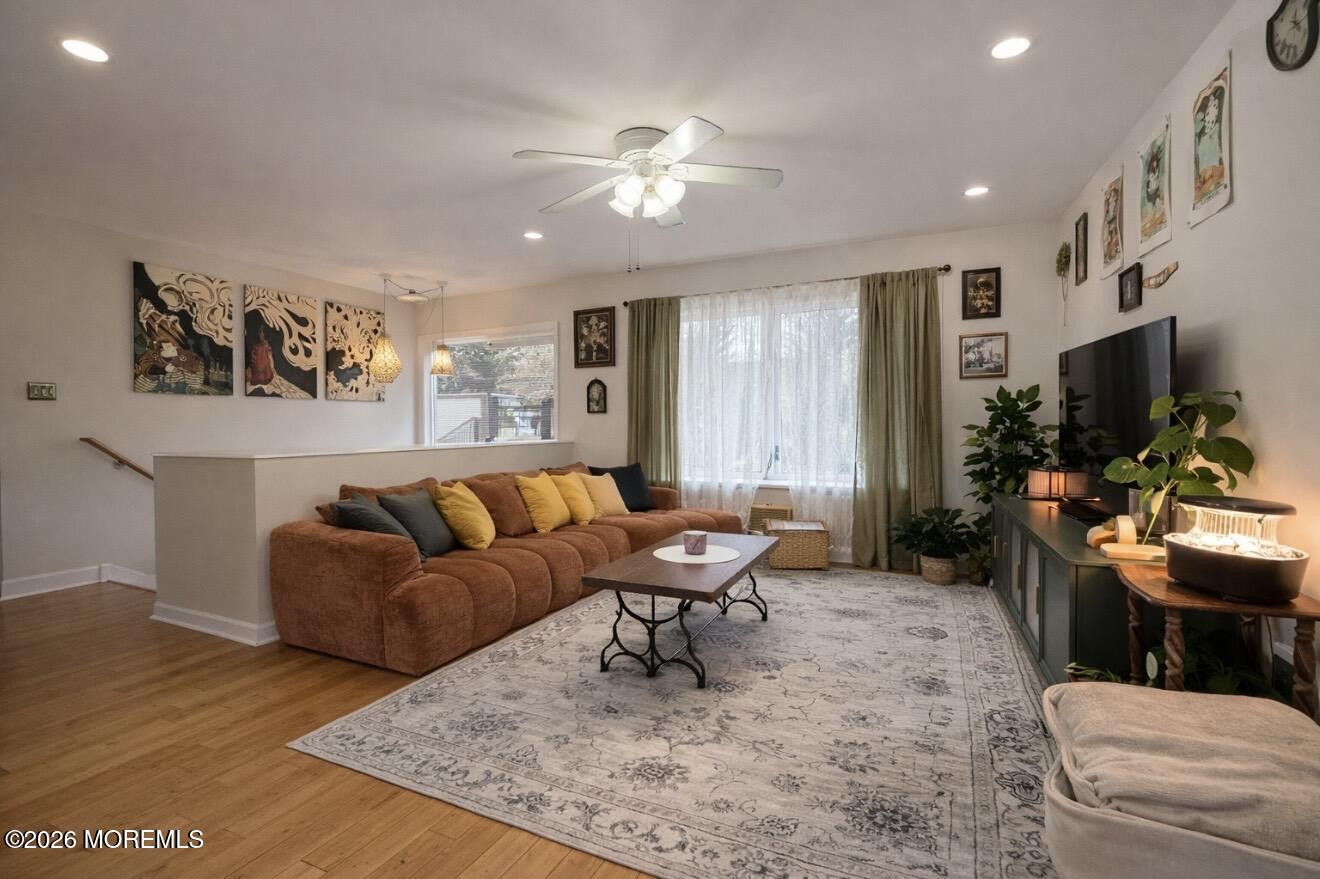 15 Commodore Court Barnegat, NJ 08005 - Photo 2 of 19 a living room with furniture and a flat screen tv