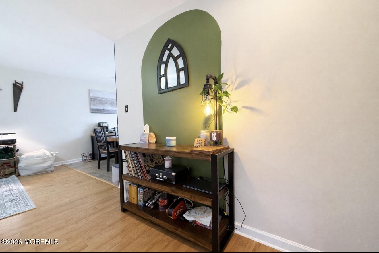 15 Commodore Court Barnegat, NJ 08005 - Photo 7 of 19 a view of a workspace room with wooden floor and furniture