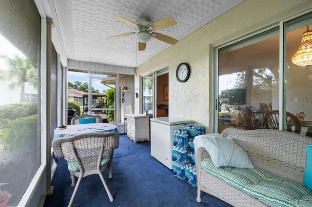 a bedroom with a bed and a table