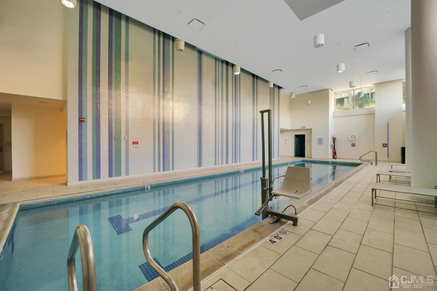 301 Hudson Park Edgewater, NJ 07020 - Photo 35 of 44 a large white kitchen with a large window