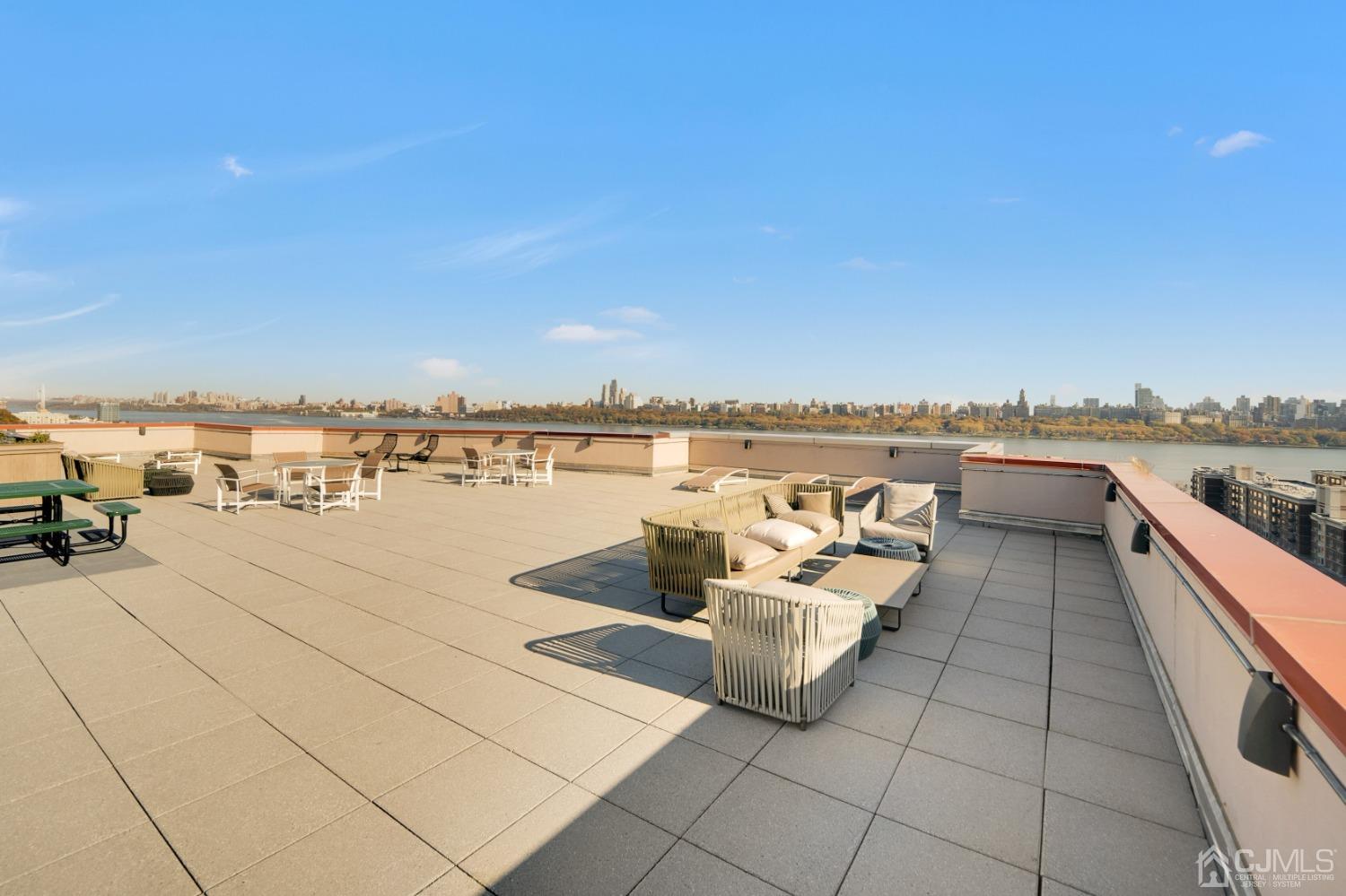 301 Hudson Park Edgewater, NJ 07020 - Photo 40 of 44 a terrace with outdoor seating and city view