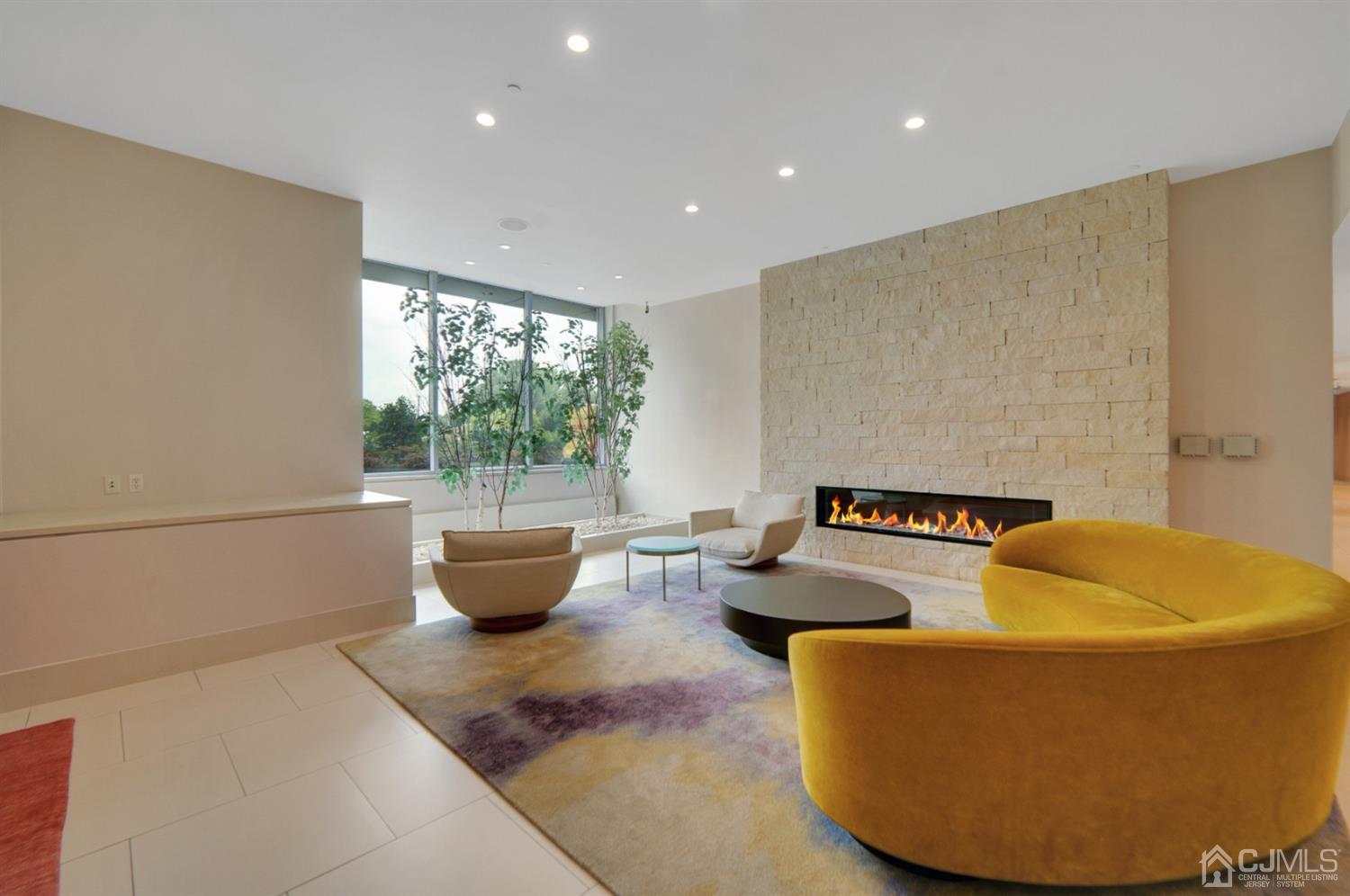 301 Hudson Park Edgewater, NJ 07020 - Photo 44 of 44 a living room with furniture and a window