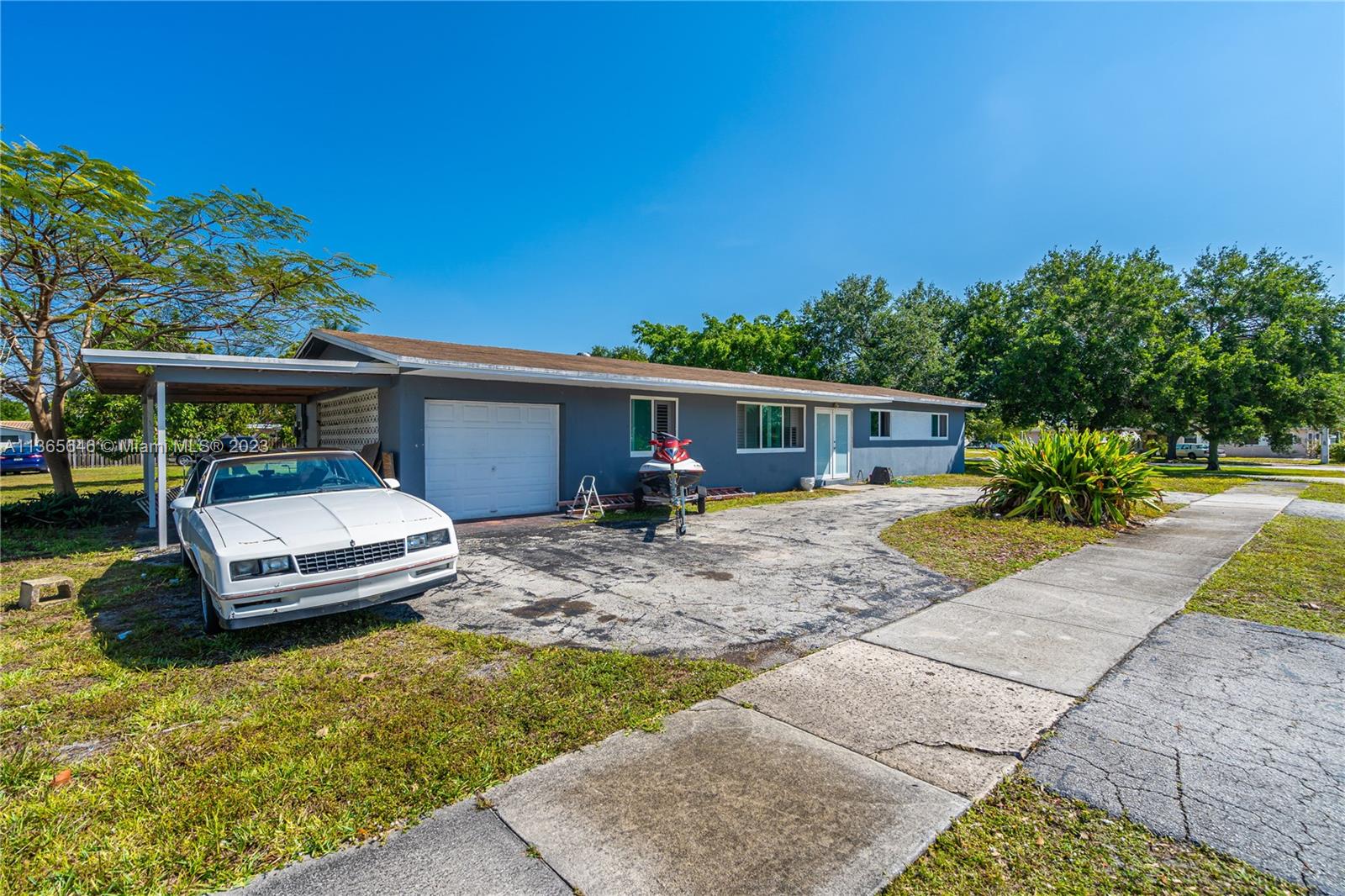 1400 North Park Road Hollywood, FL 33021 - Photo 2 of 3 a front view of a house with a yard