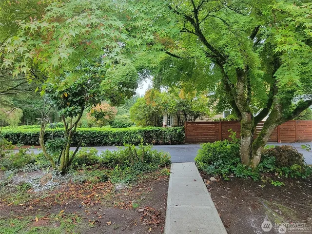 a view of backyard with green space