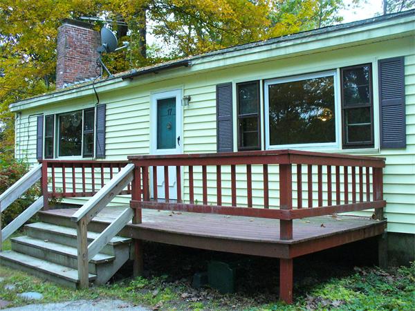 17 North Fitzwilliam Road Royalston, MA 01368 - Photo 1 of 12 a front view of a house with a roof deck