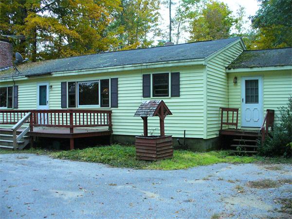 17 North Fitzwilliam Road Royalston, MA 01368 - Photo 2 of 12 a view of a house with a yard and wooden fence