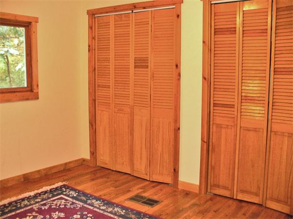 17 North Fitzwilliam Road Royalston, MA 01368 - Photo 8 of 12 a view of an empty room with a window and wooden floor