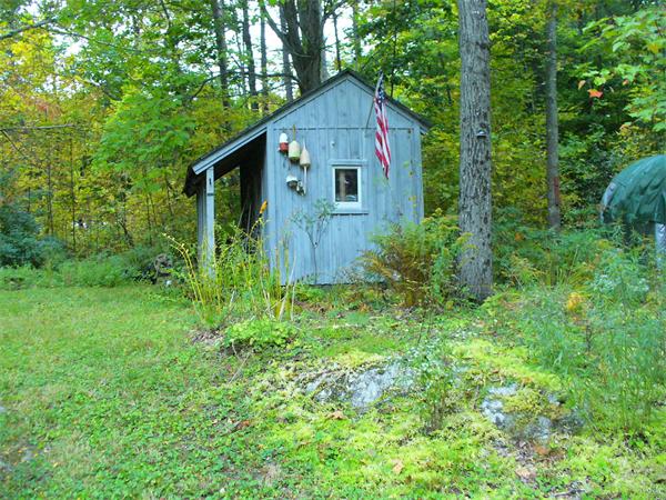 17 North Fitzwilliam Road Royalston, MA 01368 - Photo 10 of 12 a back view of a house with yard and plants