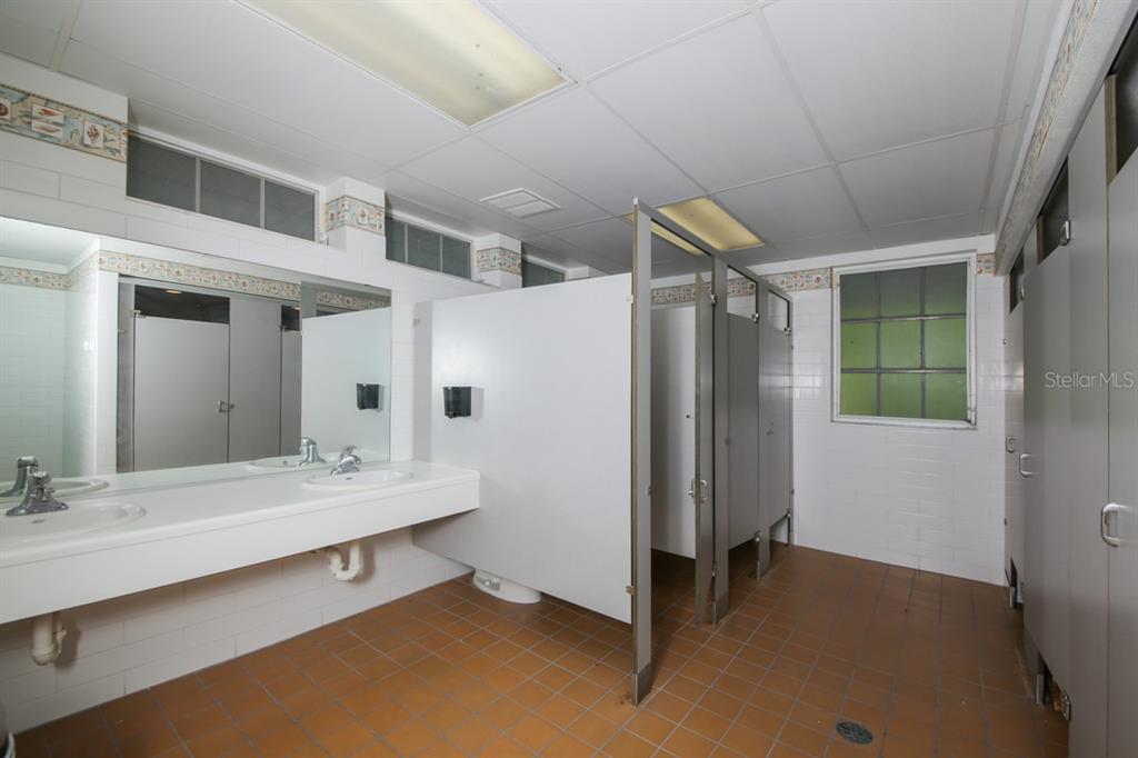 5820 Gasparilla Road, Unit SLIP 29 Boca Grande, FL 33921 - Photo 13 of 22 a bathroom with a double vanity sink and a mirror