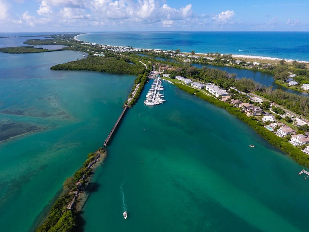5820 Gasparilla Road, Unit SLIP 29 Boca Grande, FL 33921 - Photo 21 of 22 a view of a lake with a city