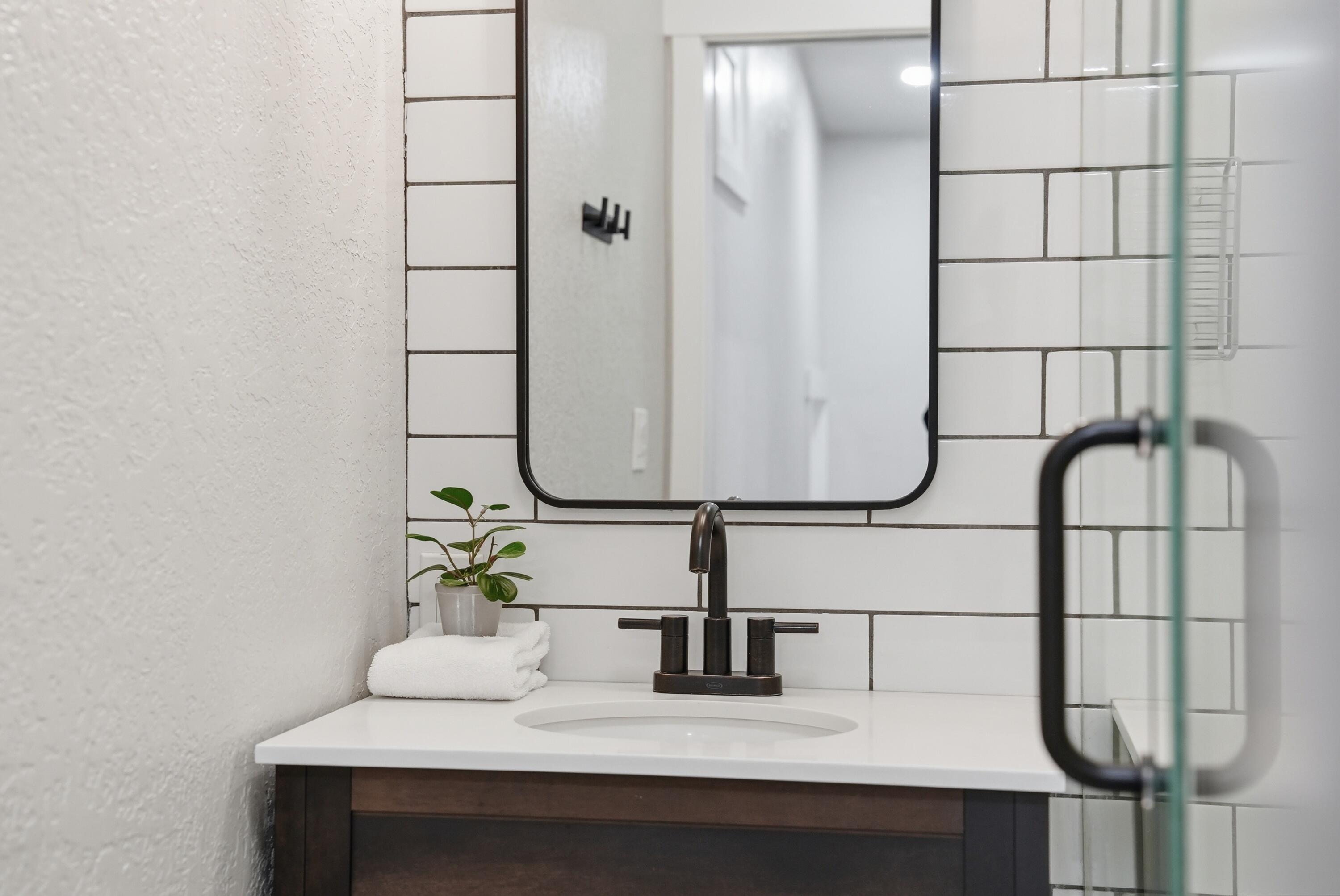 1961 Southwest Knoll Avenue Bend, OR 97702 - Photo 23 of 53 a bathroom with a sink and a mirror