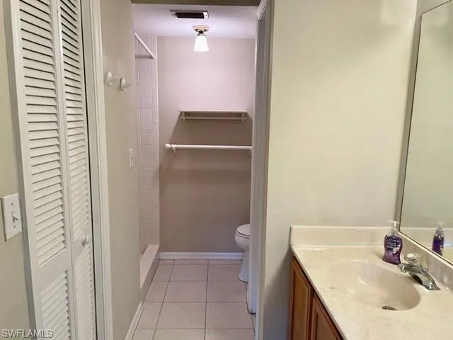 an empty room with a empty space and a window