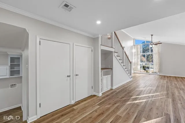 a view of entryway with wooden floor
