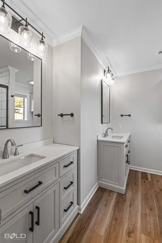 a bathroom with a sink and mirror