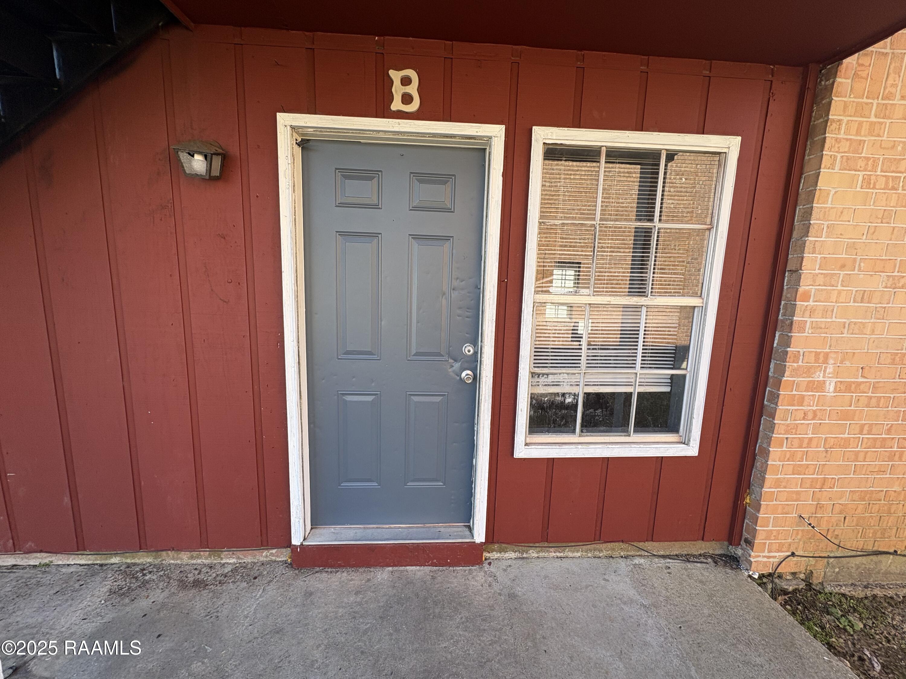 607 Marigny Circle, Unit B Duson, LA 70529 - Photo 1 of 8 Front of home