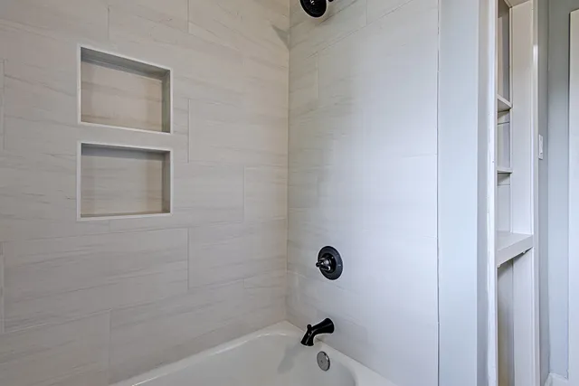 a bathroom with a bathtub