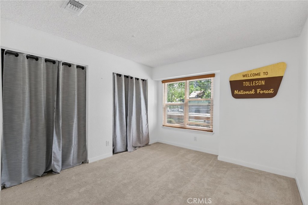 10655 Lemon Avenue, Unit 1304 Rancho Cucamonga, CA 91737 - Photo 17 of 38 a view of a livingroom with a staircase