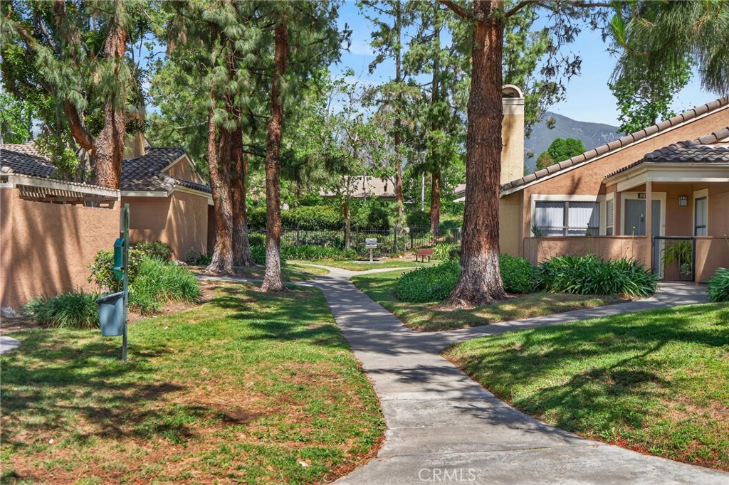 10655 Lemon Avenue, Unit 1304 Rancho Cucamonga, CA 91737 - Photo 24 of 38 a view of a yard in front of house