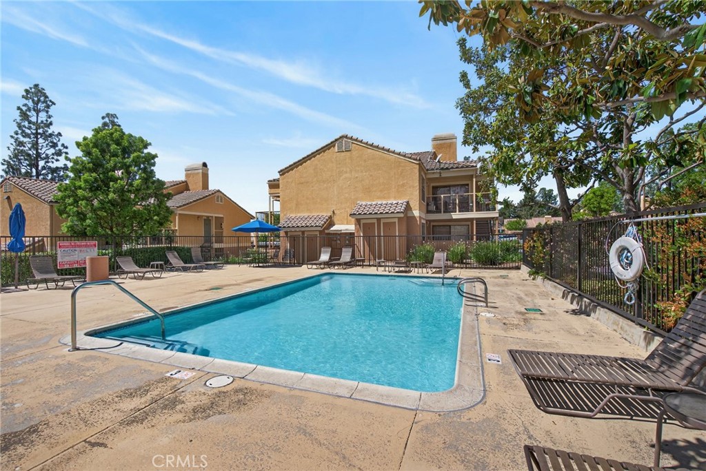 10655 Lemon Avenue, Unit 1304 Rancho Cucamonga, CA 91737 - Photo 25 of 38 swimming pool view with a seating space