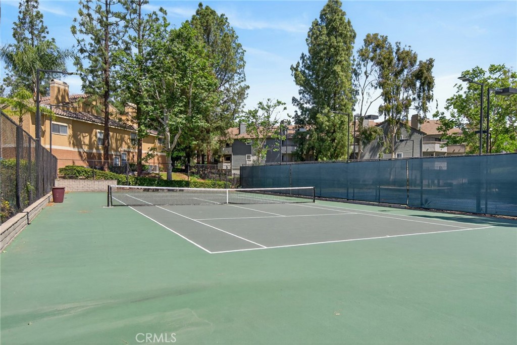 10655 Lemon Avenue, Unit 1304 Rancho Cucamonga, CA 91737 - Photo 27 of 38 a view of a tennis court