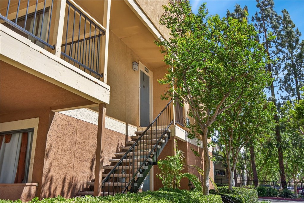 10655 Lemon Avenue, Unit 1304 Rancho Cucamonga, CA 91737 - Photo 29 of 38 a view of a house with a tree