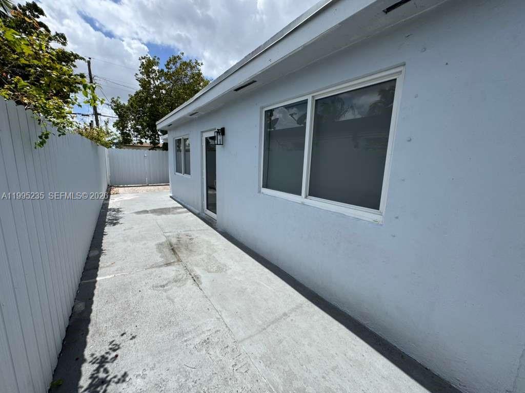 230 East 56th Street, Unit A Hialeah, FL 33013 - Photo 3 of 25 a view of backyard of house