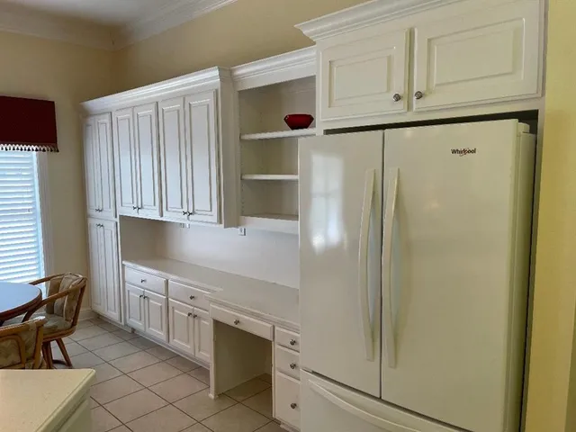 a view of a livingroom with furniture and a flat screen tv