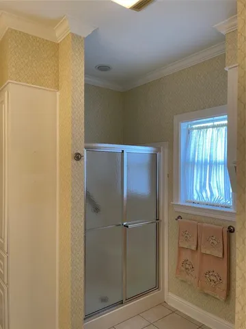 a bedroom with a bed and a closet
