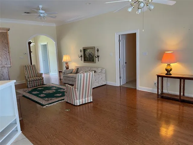 a room with furniture and wooden floor