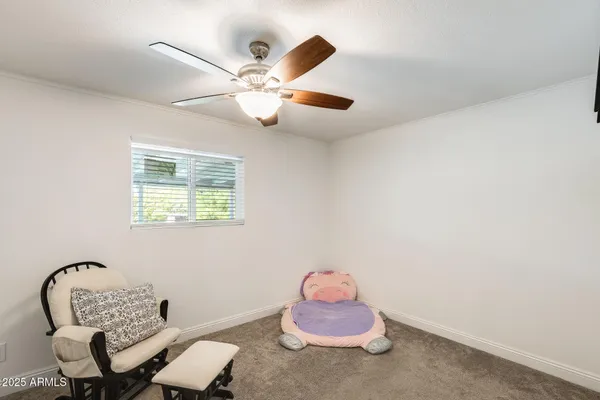 a bathroom with a sink vanity and mirror