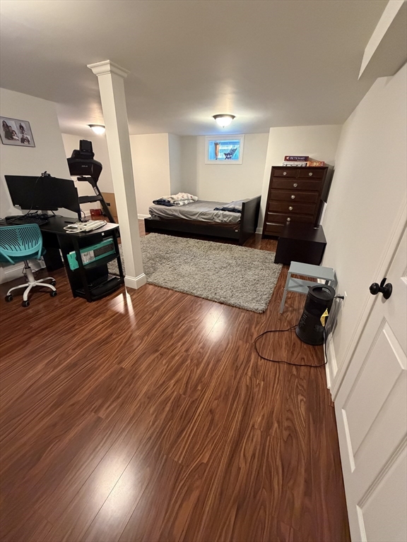 17 Cardinal Street, Unit 17 Winchester, MA 01890 - Photo 38 of 42 a living room with furniture and wooden floor