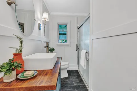 a view of kitchen island with cabinets
